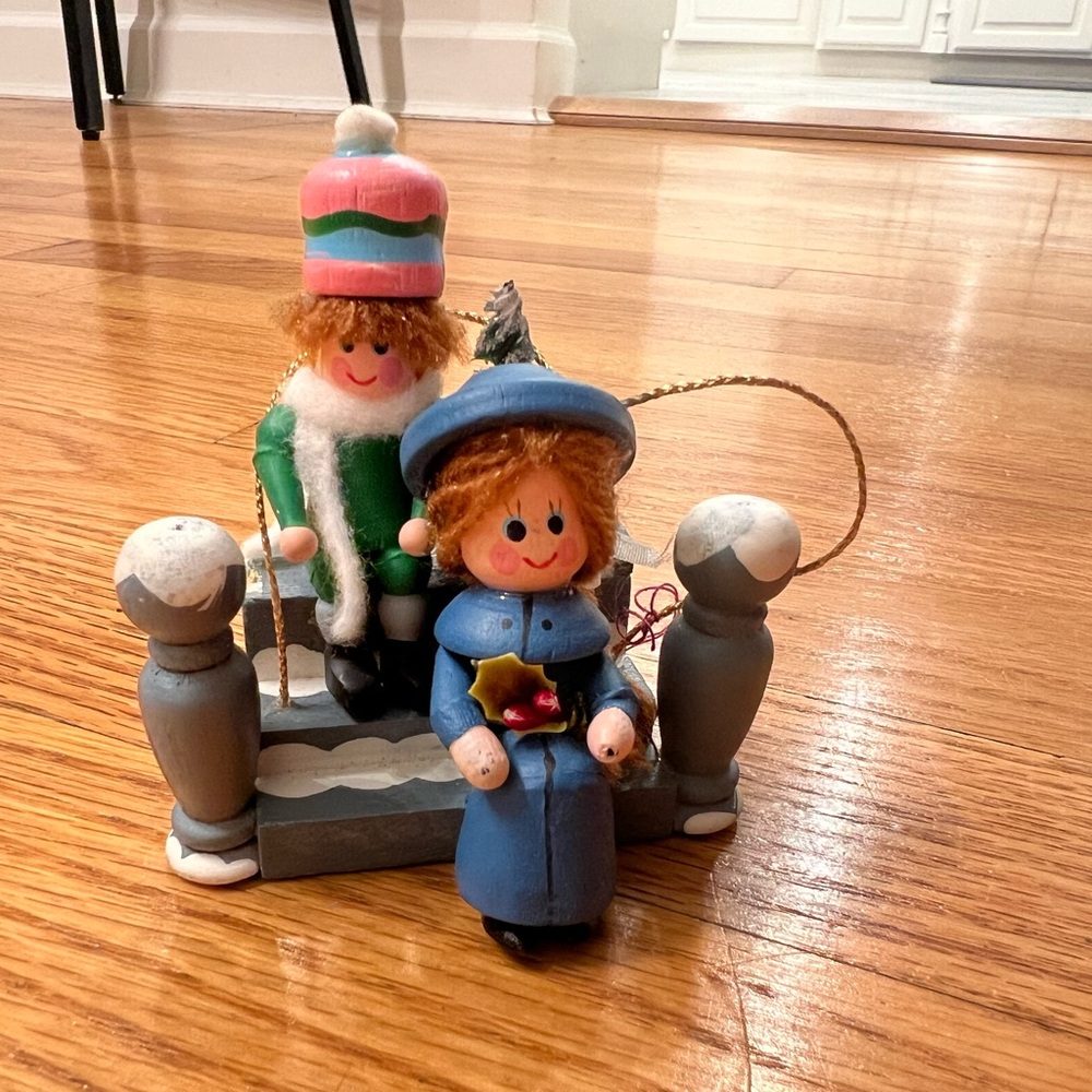 Vintage Wooden Christmas hand painted sitting on bench Ornament